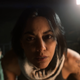 Valeria leans in to interrogate the player.
